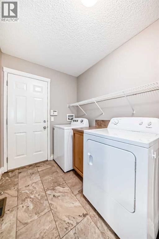 141 Somerglen Way Sw, Calgary, Alberta  T2Y 4B2 - Photo 11 - A2303715