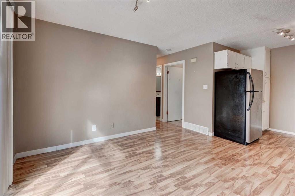 11452 8 Street Sw, Calgary, Alberta  T2W 4J5 - Photo 12 - A2289821
