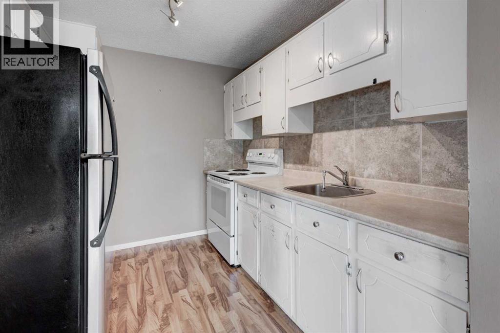 11452 8 Street Sw, Calgary, Alberta  T2W 4J5 - Photo 8 - A2289821