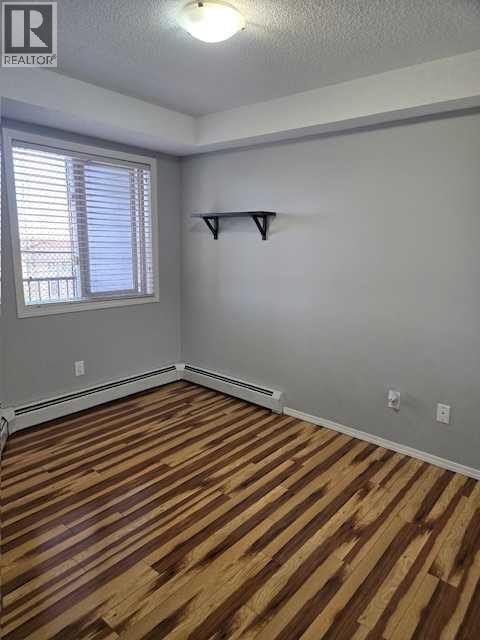 412, 7210 80 Avenue Ne, Calgary, Alberta  T3J 0N7 - Photo 12 - A2305443