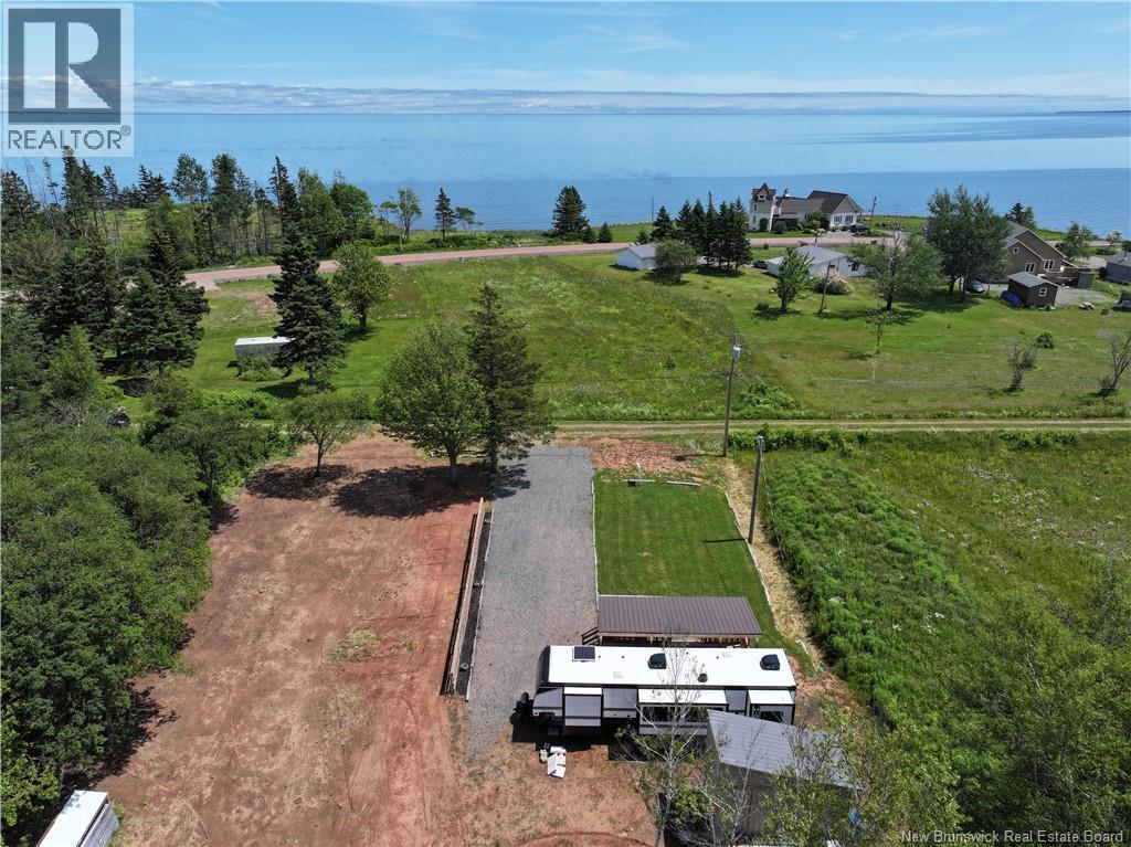 22 Allee Croix-Rouge, Bas Cap Pele, New Brunswick  E4N 1L5 - Photo 1 - NB134039