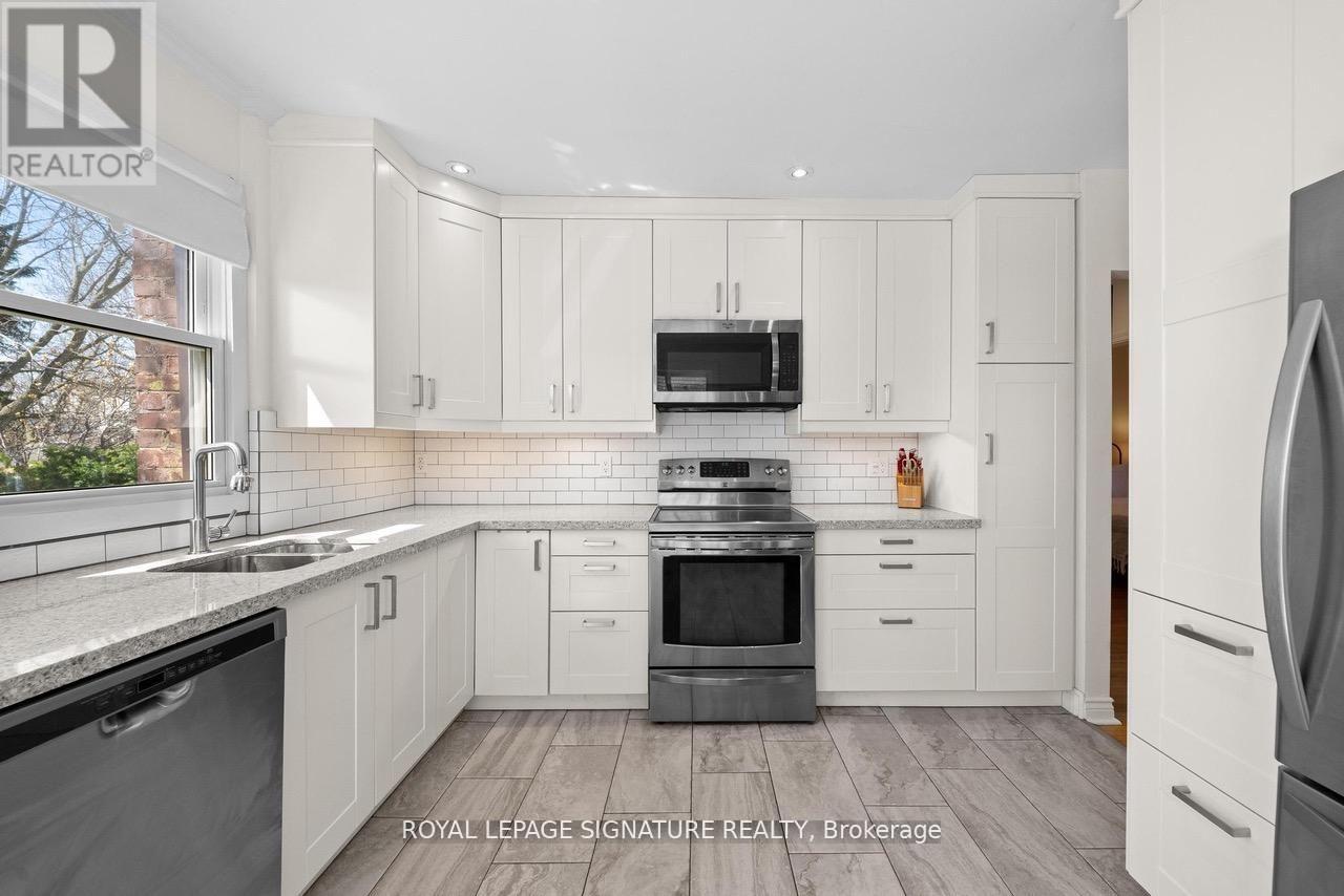 8 Wolcott Avenue, Toronto, Ontario  M1L 4K1 - Photo 2 - E13077040