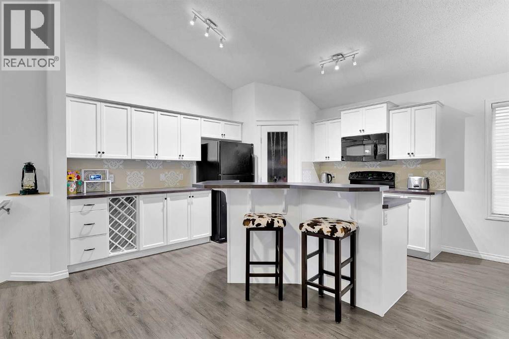 65 Sunset Heights, Cochrane, Alberta  T4C 0C7 - Photo 7 - A2283840