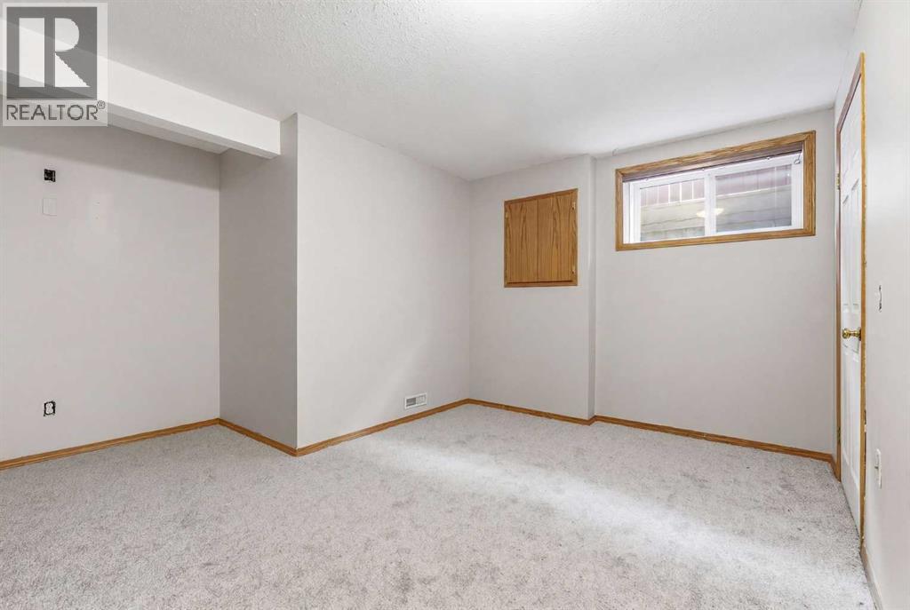 105 Crystalridge Drive, Okotoks, Alberta  T1S 1P4 - Photo 36 - A2301384