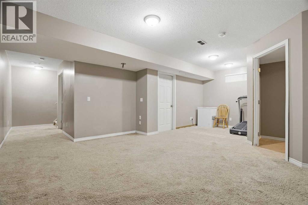 202 New Brighton Manor Se, Calgary, Alberta  T2Z 4J4 - Photo 37 - A2306864