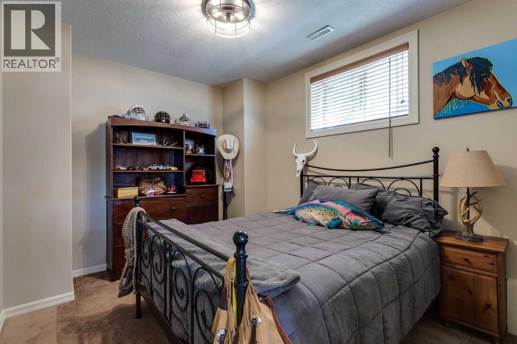 210 Crystal Shores Drive, Okotoks, Alberta  T1S 2C5 - Photo 39 - A2305970