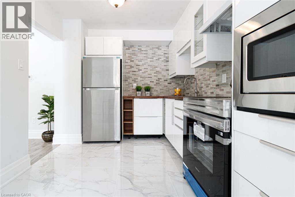 1532 Lancaster Drive Unit# 41, Oakville, Ontario  L6H 2Z3 - Photo 15 - 40826567