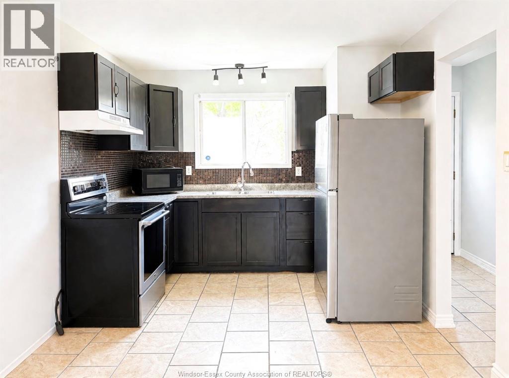 3057 Meadowbrook Lane Unit# 3, Windsor, Ontario  N8T 3C5 - Photo 6 - 26009956