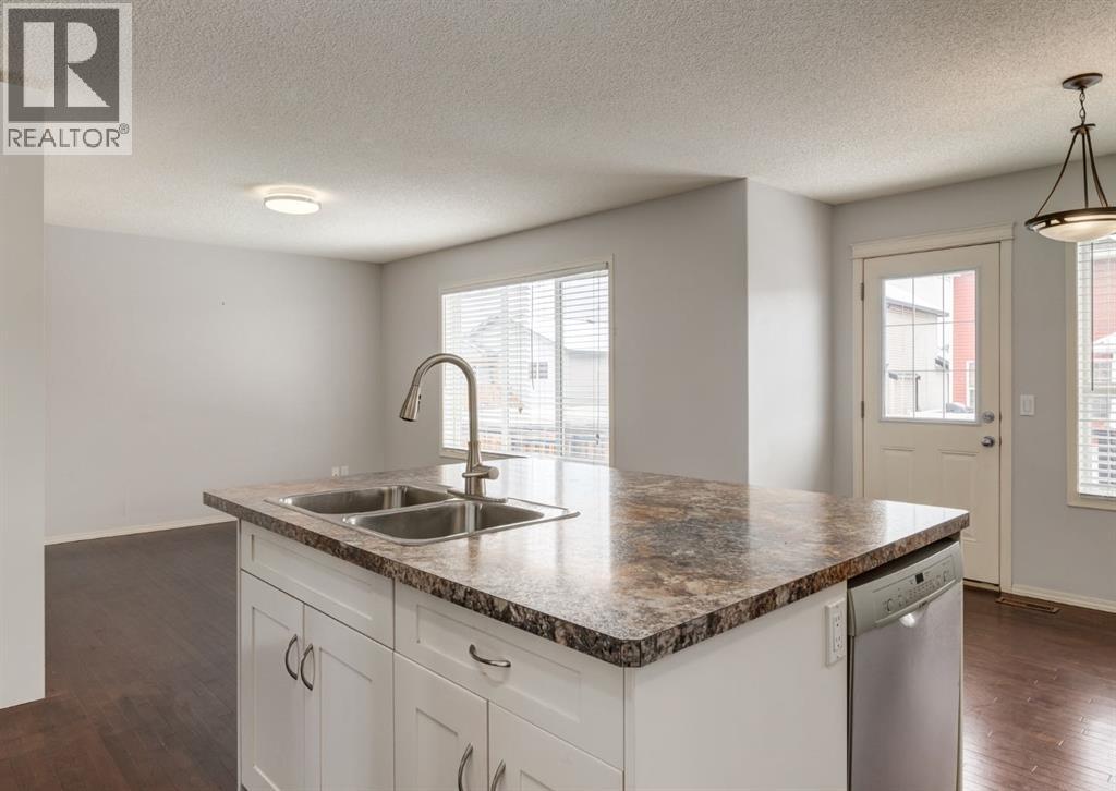 113 Luxstone Green Sw, Airdrie, Alberta  T4B 3B9 - Photo 8 - A2294849