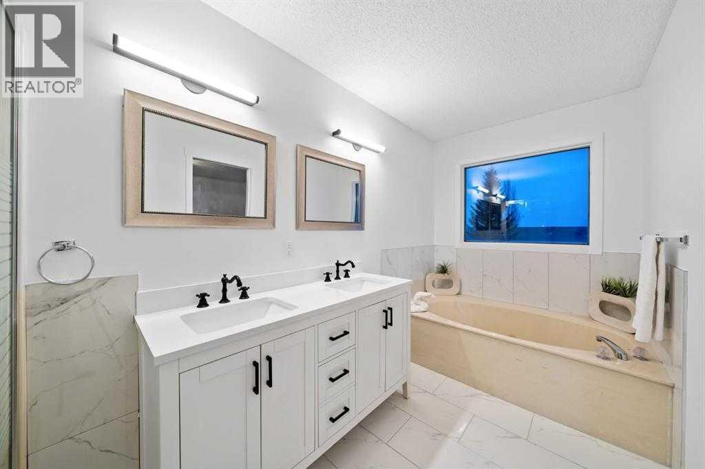 16 Sandringham Close NW, Calgary, Alberta  T3K 3W8 - Photo 25 - A2286563