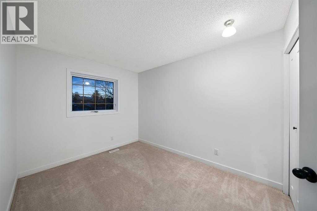 16 Sandringham Close NW, Calgary, Alberta  T3K 3W8 - Photo 27 - A2286563
