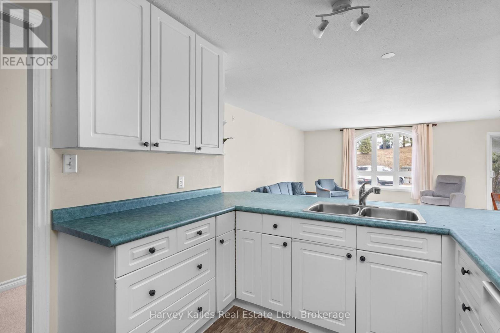 107 - 31 Dairy Lane, Huntsville, Ontario  P1H 2L7 - Photo 14 - X12955268