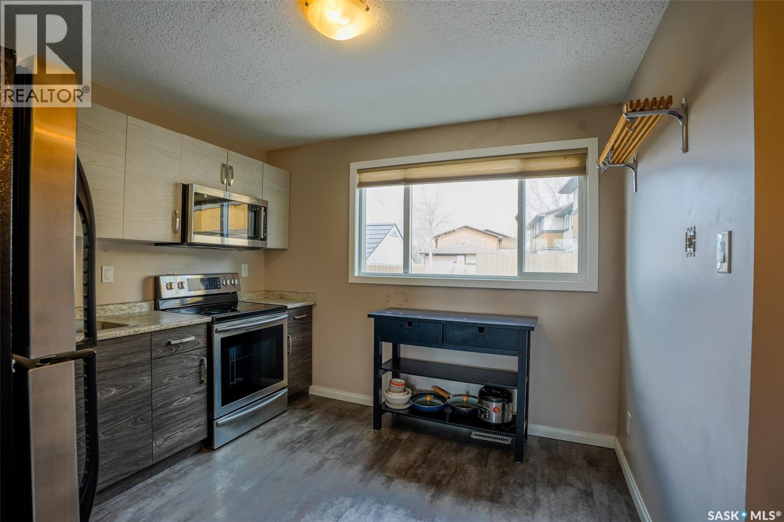 91 Mackenzie Way, Regina, Saskatchewan  S4N 5M8 - Photo 5 - SK034737