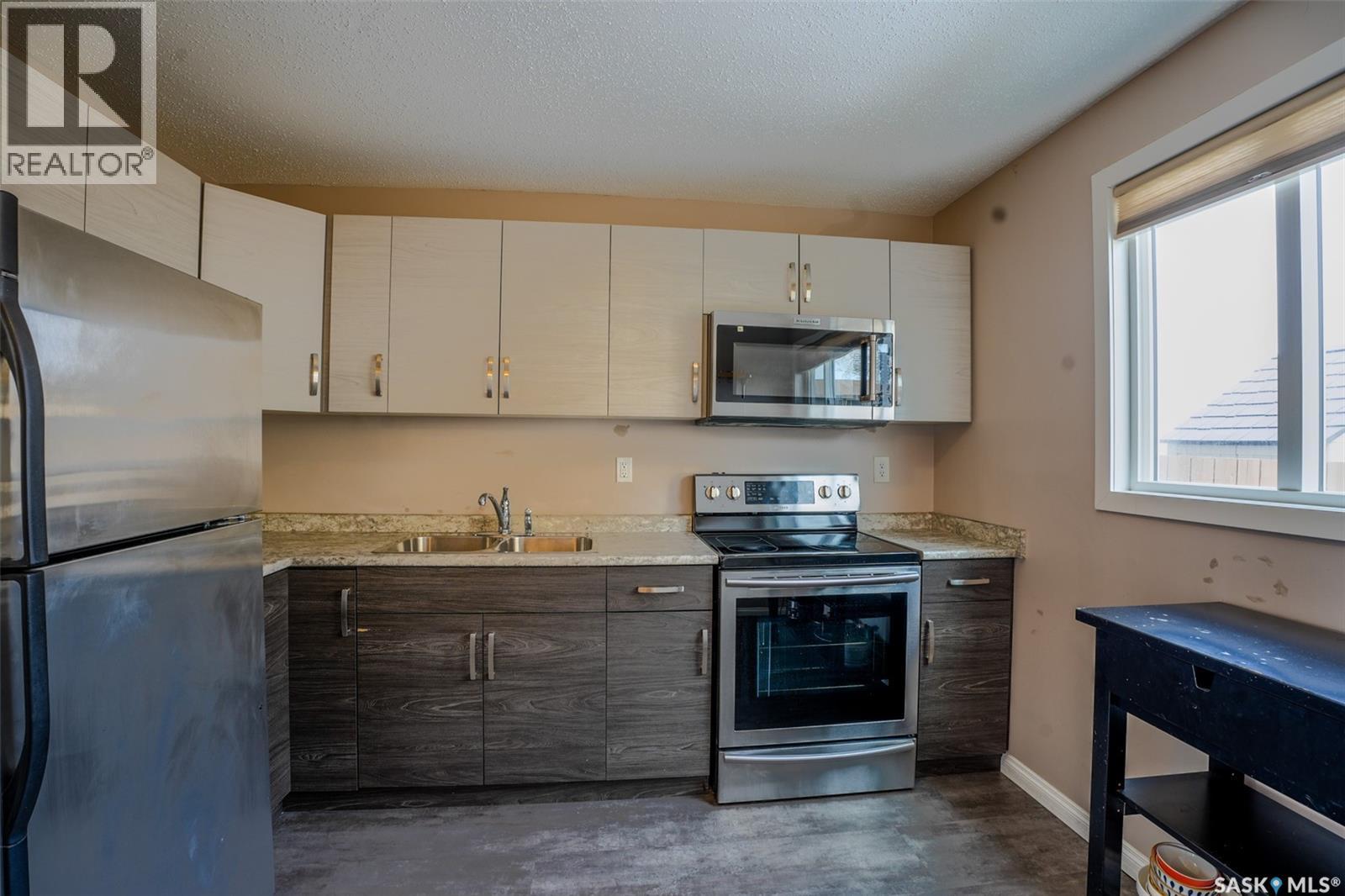 91 Mackenzie Way, Regina, Saskatchewan  S4N 5M8 - Photo 6 - SK034737