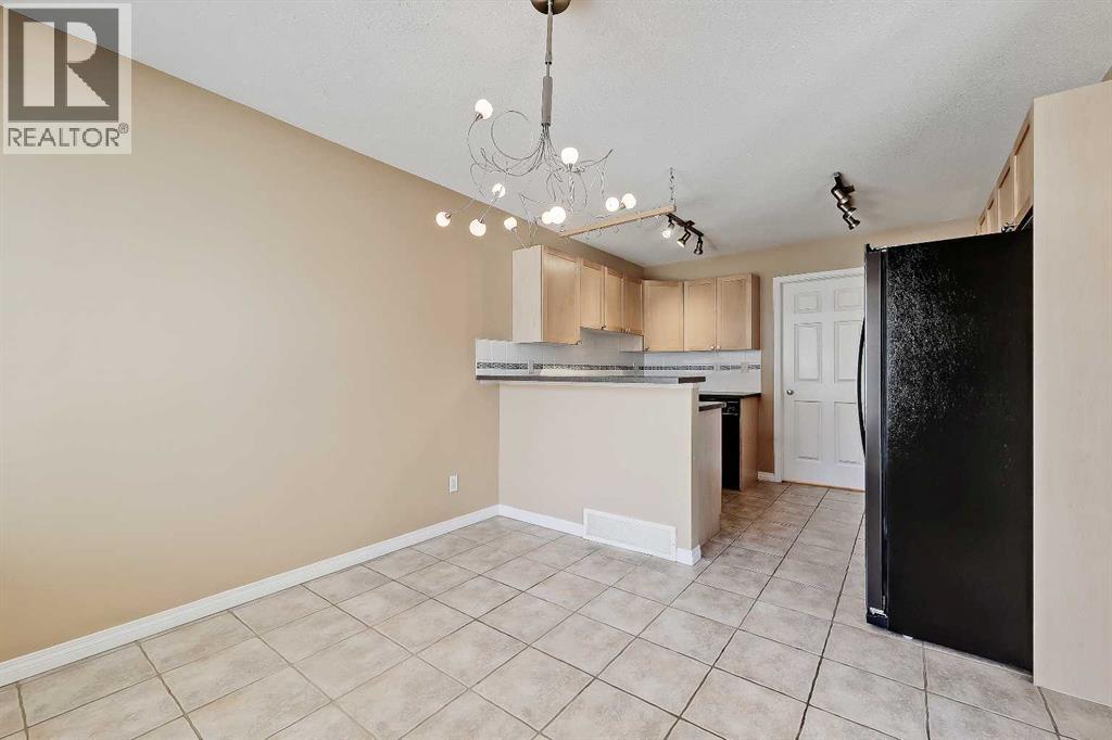 40 Simcoe Place SW, Calgary, Alberta  T3H 4T8 - Photo 3 - A2305616