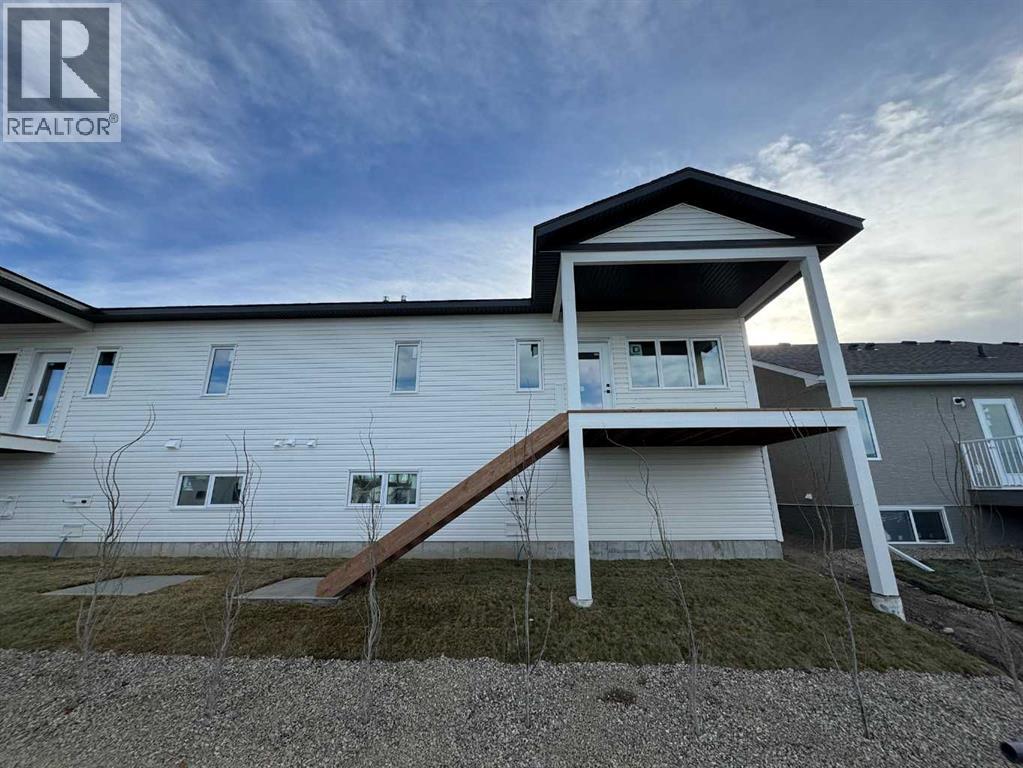 423 Meadowlark Way, Vulcan, Alberta  T0L 2B0 - Photo 2 - A2253580