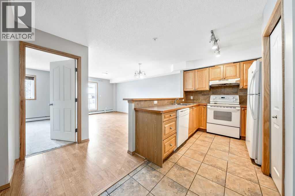 103, 92 Saddletree Court NE, Calgary, Alberta  T3J 0K9 - Photo 2 - A2283161