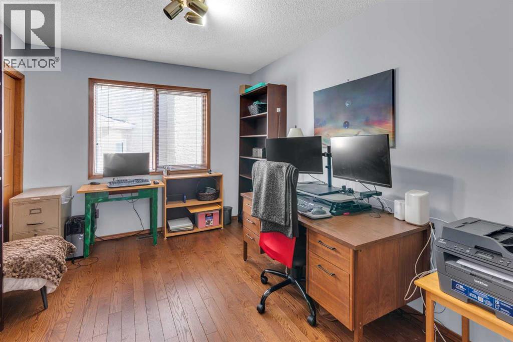 220 Woodbrook Mews Sw, Calgary, Alberta  T2W 4P8 - Photo 18 - A2298872