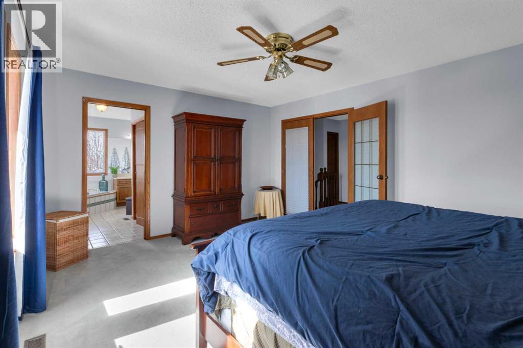 220 Woodbrook Mews Sw, Calgary, Alberta  T2W 4P8 - Photo 22 - A2298872