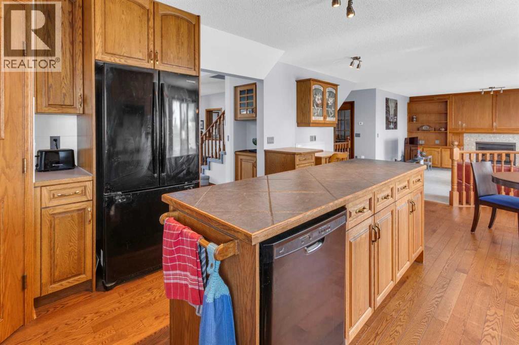 220 Woodbrook Mews Sw, Calgary, Alberta  T2W 4P8 - Photo 9 - A2298872