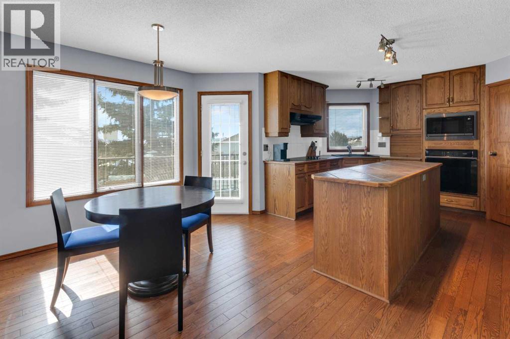 220 Woodbrook Mews Sw, Calgary, Alberta  T2W 4P8 - Photo 11 - A2298872