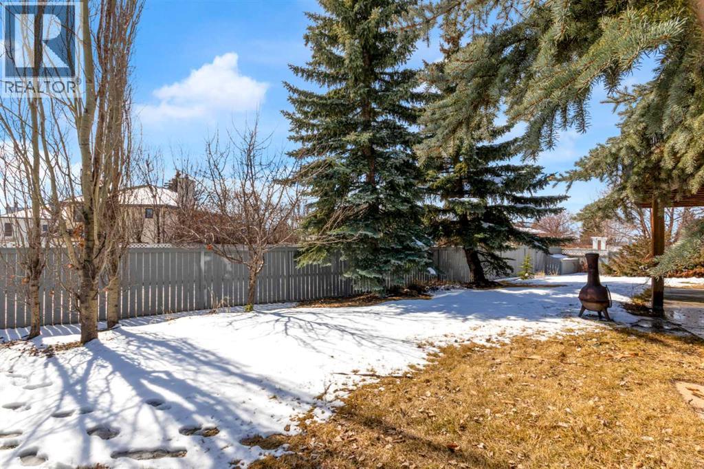 220 Woodbrook Mews Sw, Calgary, Alberta  T2W 4P8 - Photo 35 - A2298872