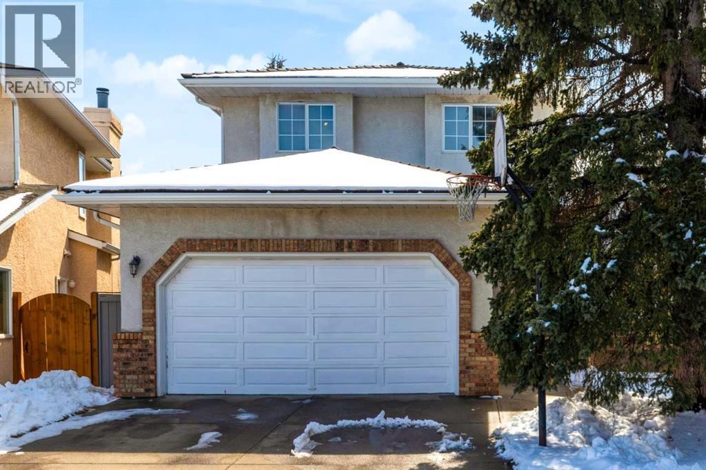 220 Woodbrook Mews Sw, Calgary, Alberta  T2W 4P8 - Photo 1 - A2298872