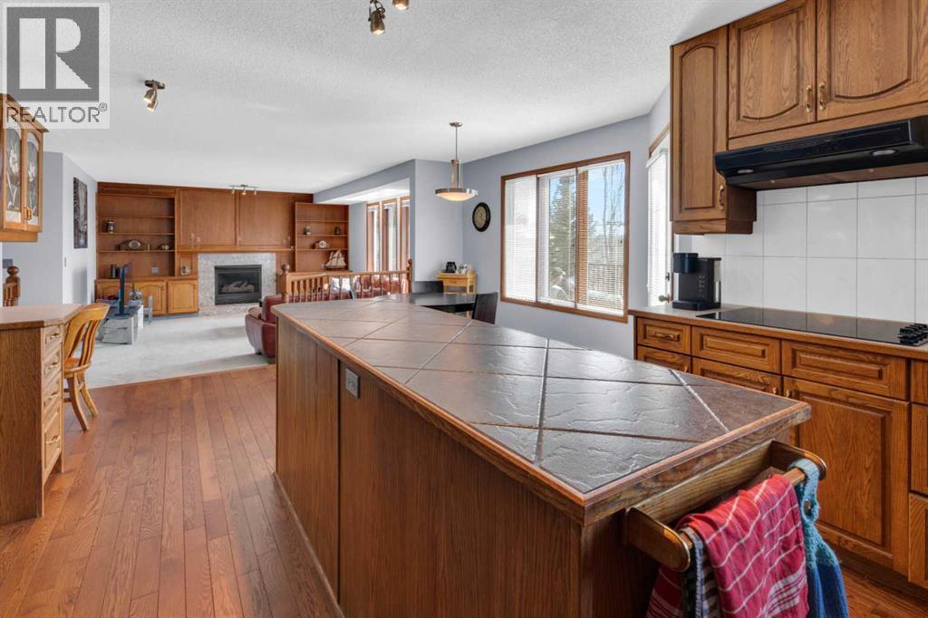 220 Woodbrook Mews Sw, Calgary, Alberta  T2W 4P8 - Photo 10 - A2298872