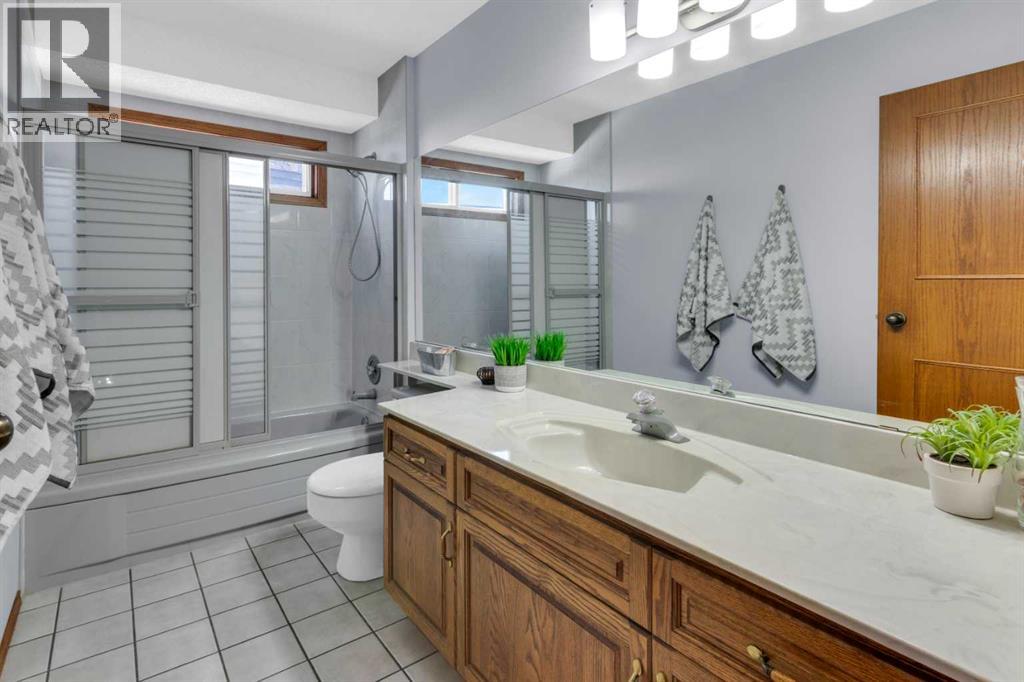 220 Woodbrook Mews Sw, Calgary, Alberta  T2W 4P8 - Photo 27 - A2298872