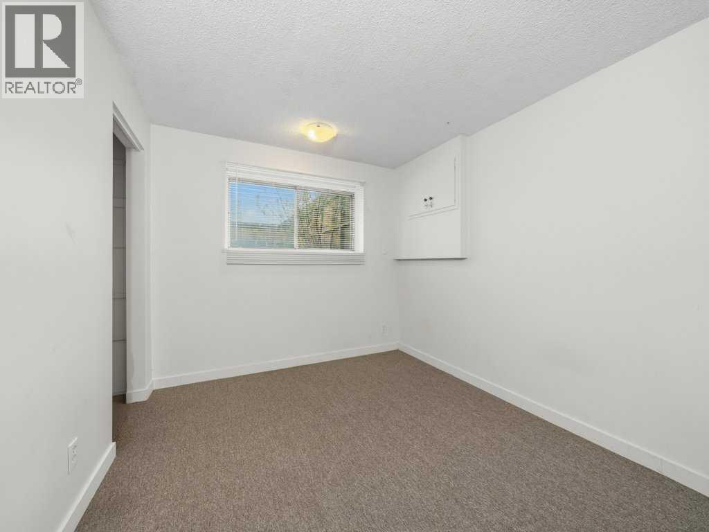11759 Canfield Road SW, Calgary, Alberta  T2W 1J6 - Photo 17 - A2307595