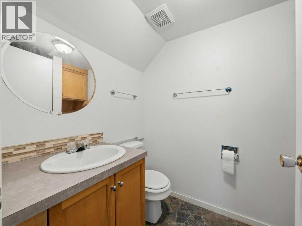 11759 Canfield Road SW, Calgary, Alberta  T2W 1J6 - Photo 19 - A2307595