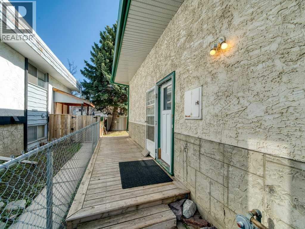 11759 Canfield Road SW, Calgary, Alberta  T2W 1J6 - Photo 2 - A2307595