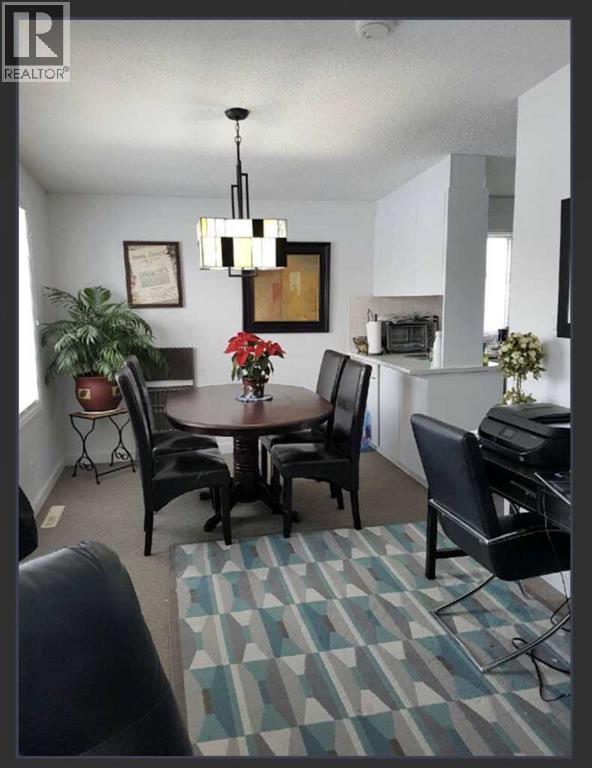 11759 Canfield Road SW, Calgary, Alberta  T2W 1J6 - Photo 7 - A2307595