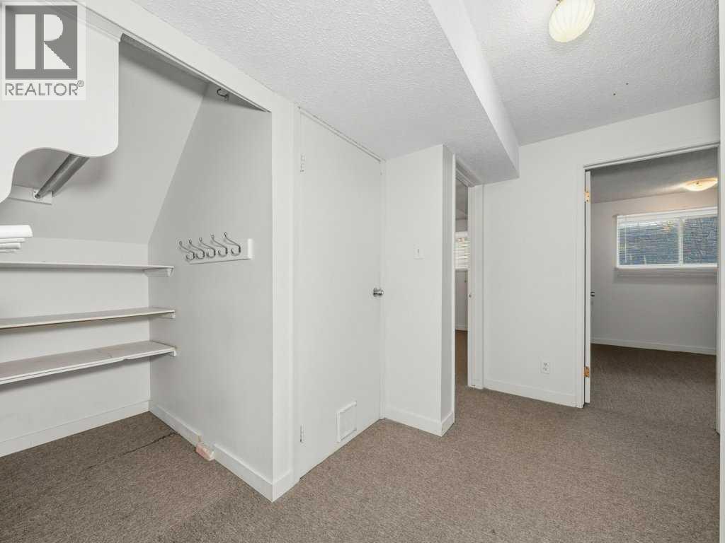 11759 Canfield Road SW, Calgary, Alberta  T2W 1J6 - Photo 8 - A2307595