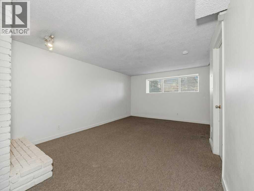 11759 Canfield Road SW, Calgary, Alberta  T2W 1J6 - Photo 9 - A2307595