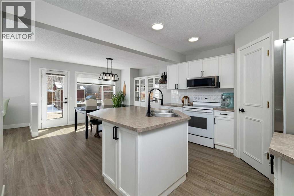 316 Mt Brewster Circle SE, Calgary, Alberta  T2Z 3J2 - Photo 2 - A2296159