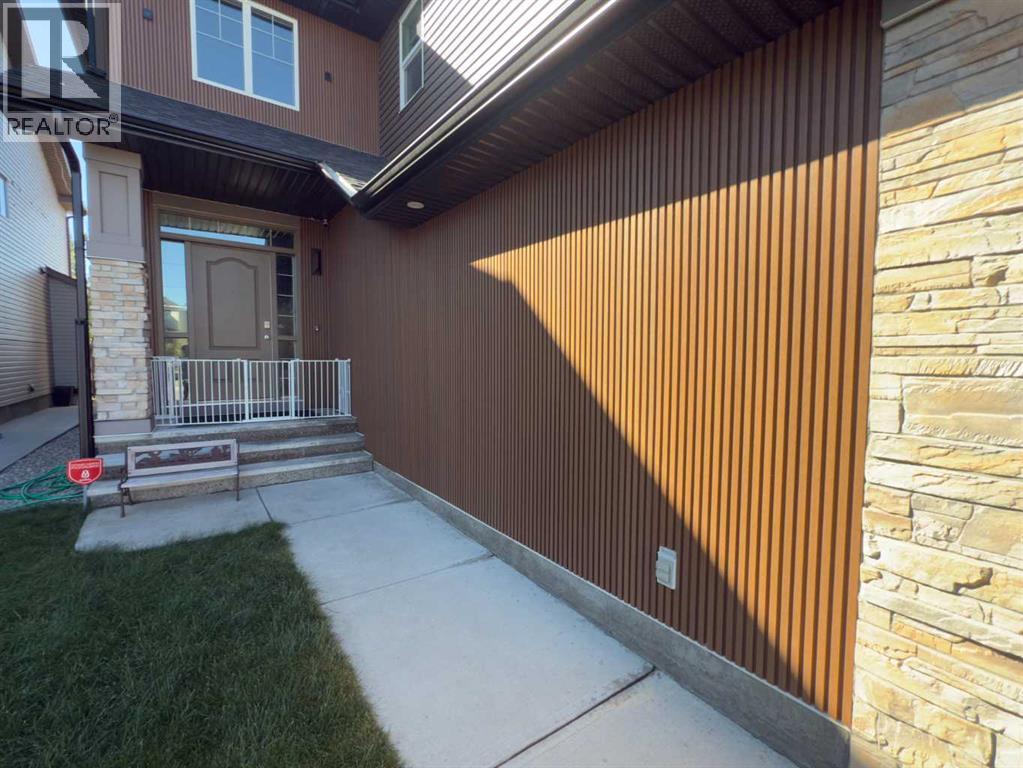 119 Panton Landing Nw, Calgary, Alberta  T3K 0W4 - Photo 3 - A2301019