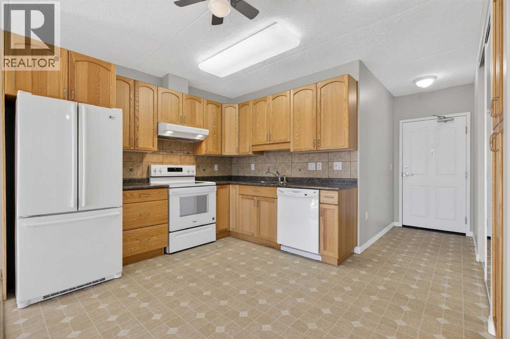 302, 400 1 Avenue Se, Diamond Valley, Alberta  T0L 0H0 - Photo 4 - A2286296