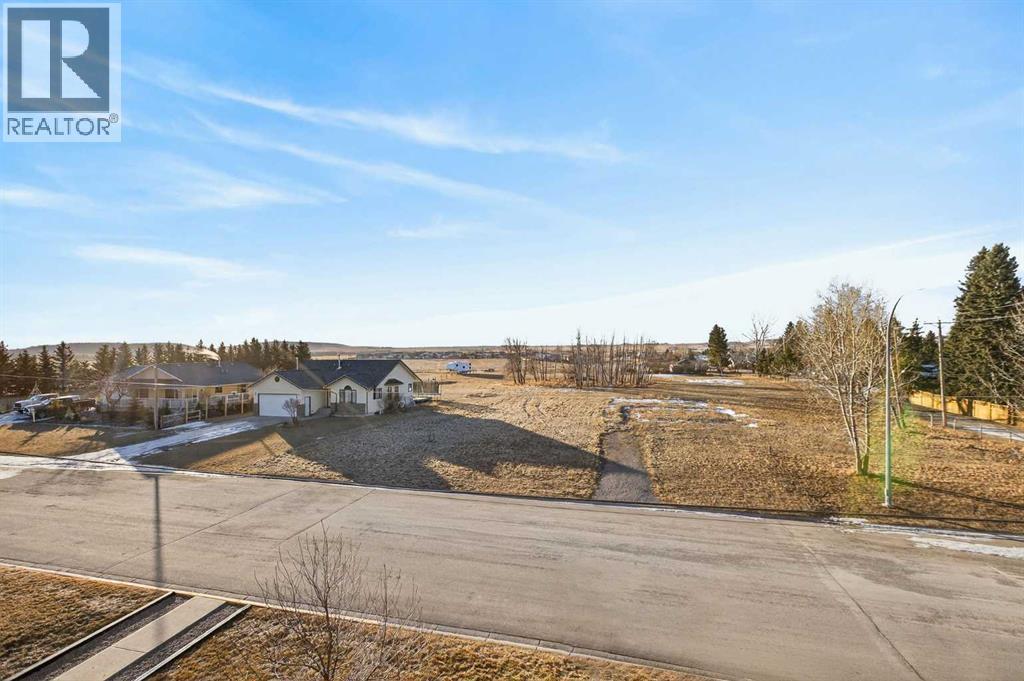 302, 400 1 Avenue Se, Diamond Valley, Alberta  T0L 0H0 - Photo 33 - A2286296