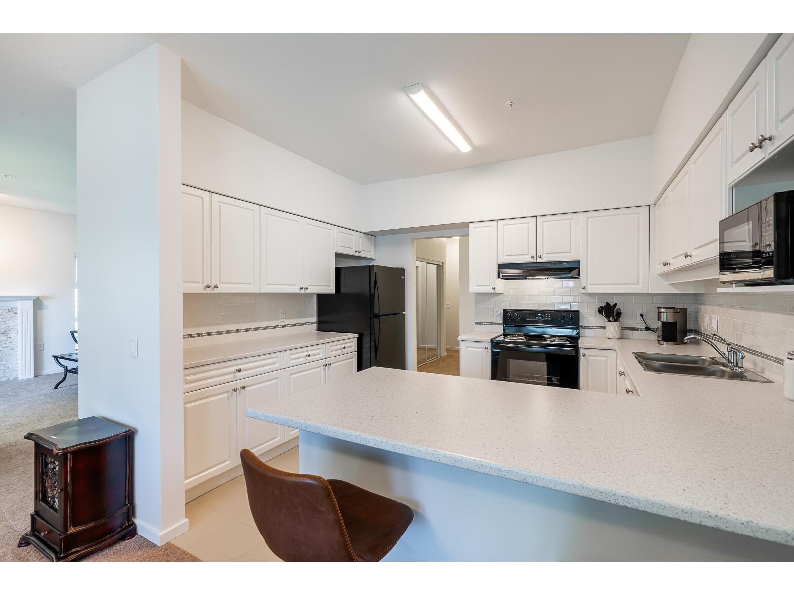202 13911 70 Avenue, Surrey, British Columbia  V3W 6B4 - Photo 12 - R3119013