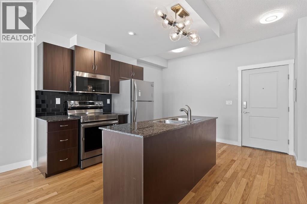 6409, 11811 Lake Fraser Drive Se, Calgary, Alberta  T2J 7J1 - Photo 4 - A2303475