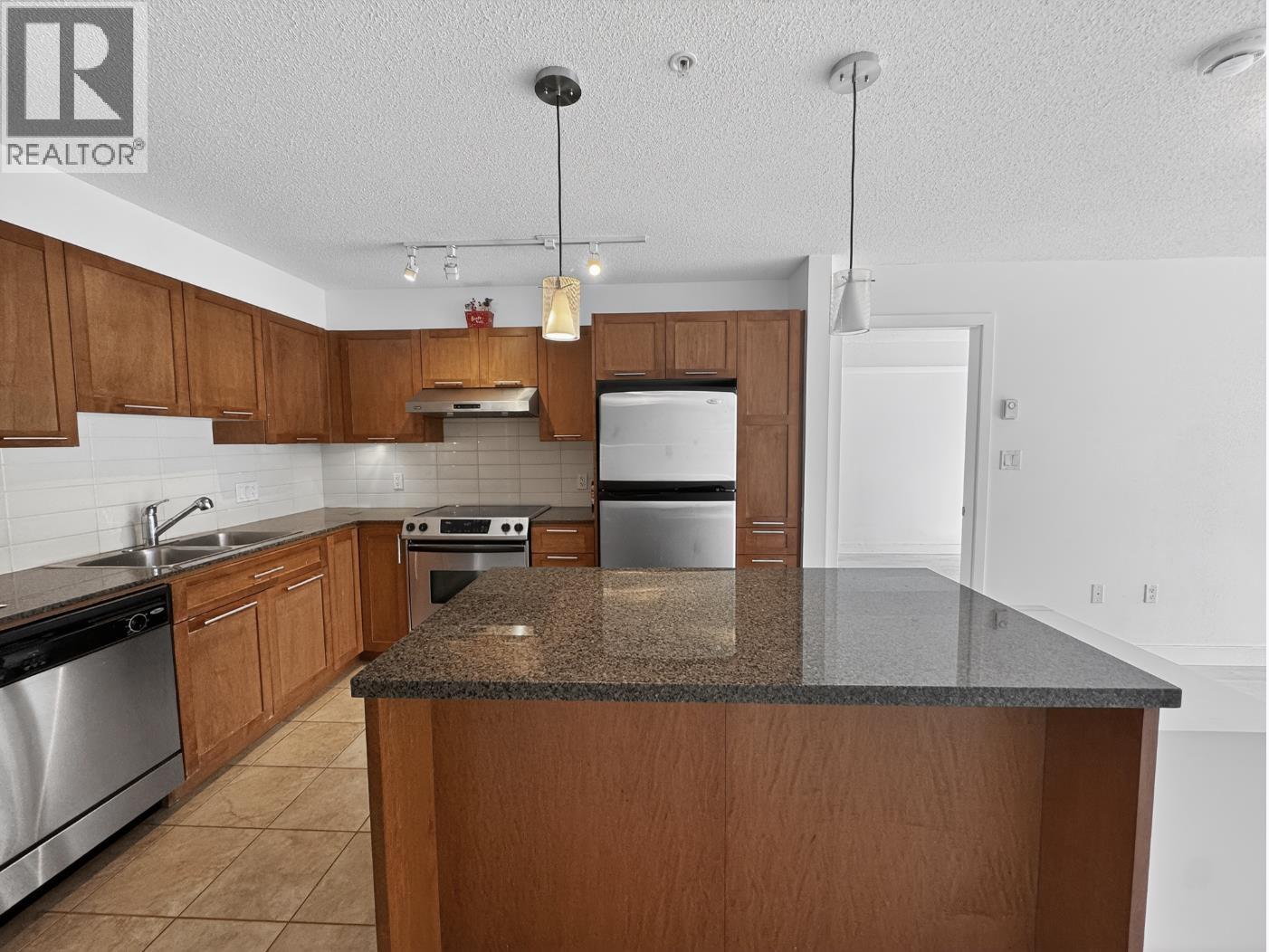207 19673 Meadow Gardens Way, Pitt Meadows, British Columbia  V3Y 0A1 - Photo 2 - R3118895