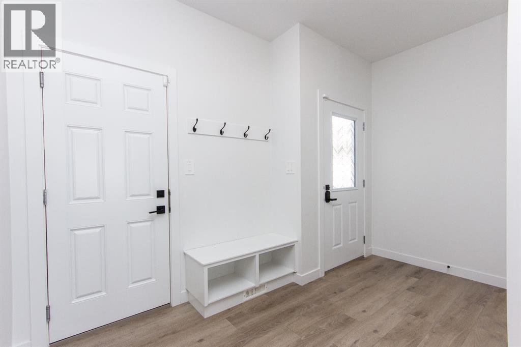 66 Henderson Crescent, Penhold, Alberta  T0M 1R0 - Photo 2 - A2290633