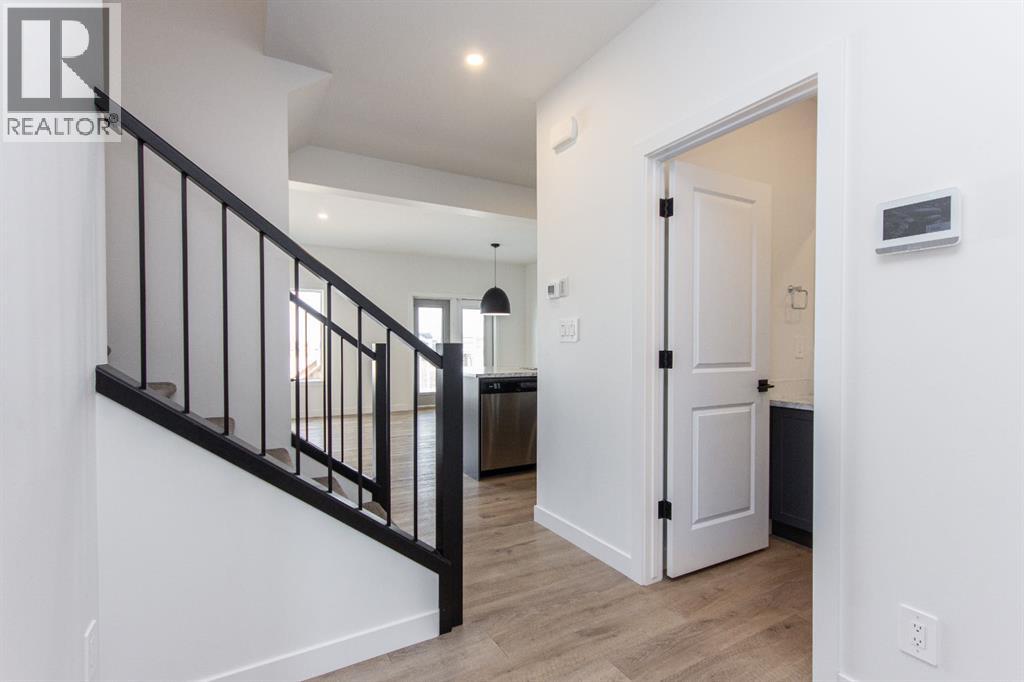 66 Henderson Crescent, Penhold, Alberta  T0M 1R0 - Photo 3 - A2290633