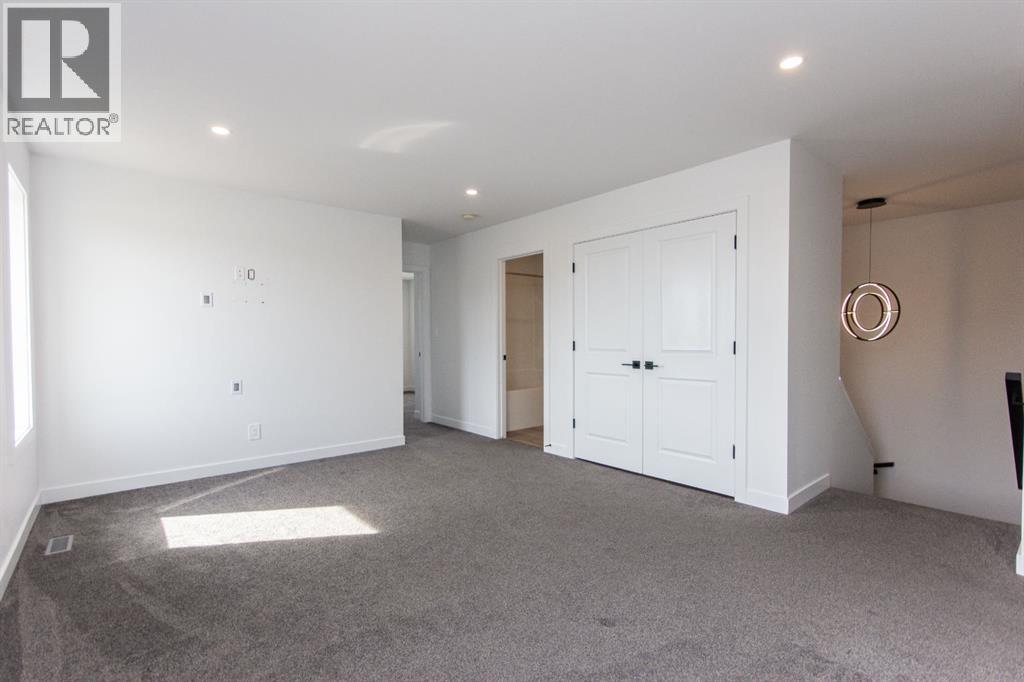 66 Henderson Crescent, Penhold, Alberta  T0M 1R0 - Photo 16 - A2290633