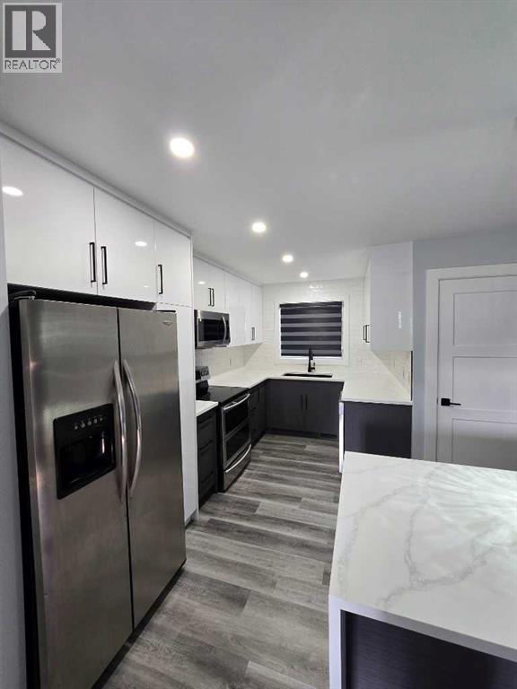 327 Rundleview Drive Ne, Calgary, Alberta  T1Y 1H9 - Photo 13 - A2293376