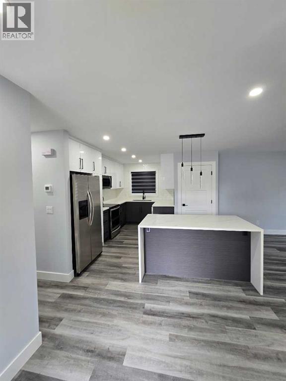 327 Rundleview Drive Ne, Calgary, Alberta  T1Y 1H9 - Photo 2 - A2293376