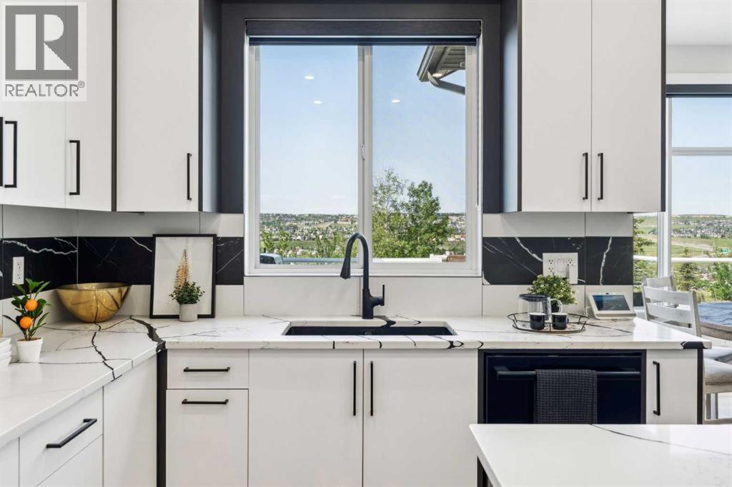 182 Panamount Road NW, Calgary, Alberta  T3K 0H8 - Photo 7 - A2306505