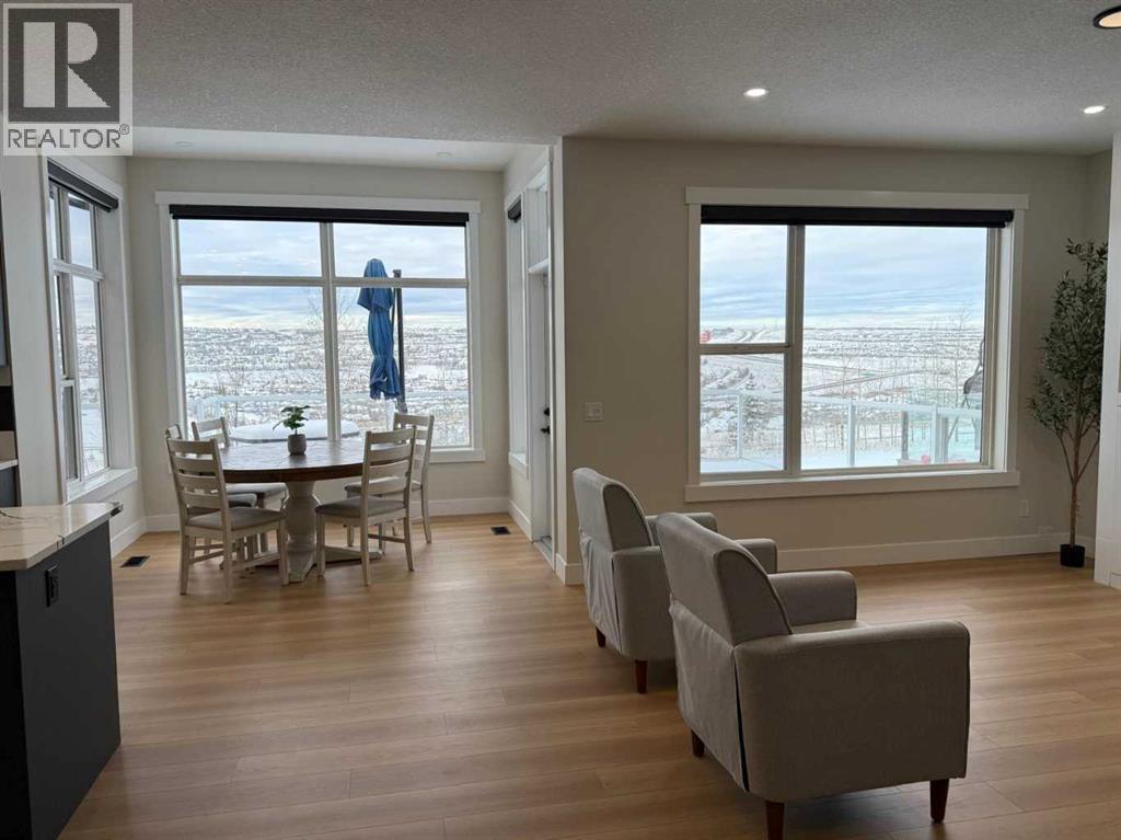 182 Panamount Road NW, Calgary, Alberta  T3K 0H8 - Photo 11 - A2306505