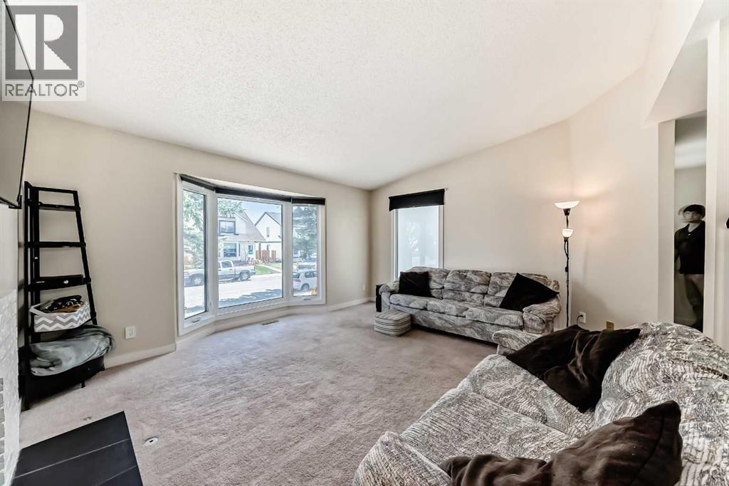 119 Woodglen Grove Sw, Calgary, Alberta  T2W 4J9 - Photo 9 - A2304961